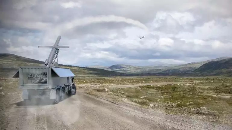 Représentation d'un véhicule équipé d'un lance-missiles conteneurisé pour tirer des missiles low-cost Crossbow One Way Effector Heavy (Crossbow OWE H).